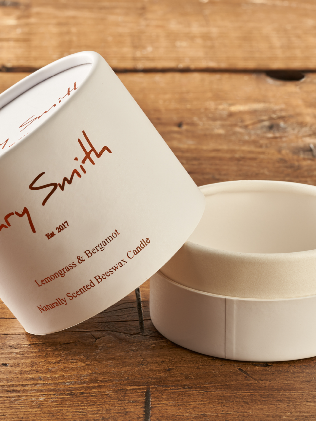 Buttjoint tube for candles with a rolled edge in a cream colour.